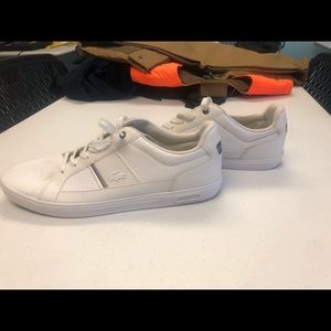 Lacoste 7-34spm white and tan sneakers.